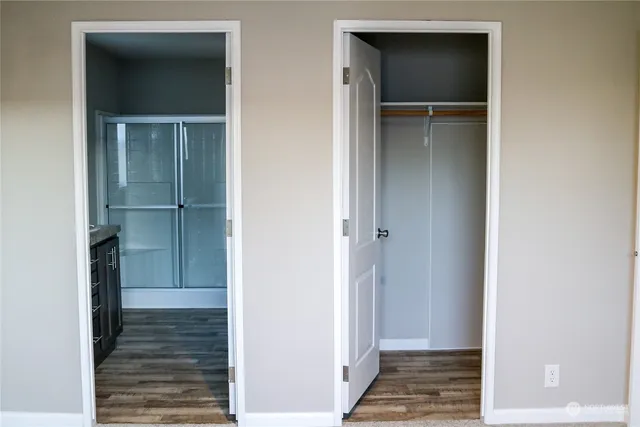 a view of wooden floor and cabinet