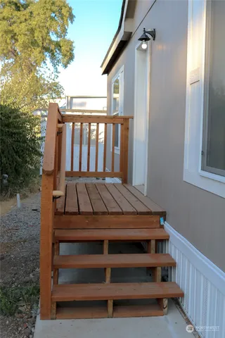 a view of a kitchen with a refrigerator