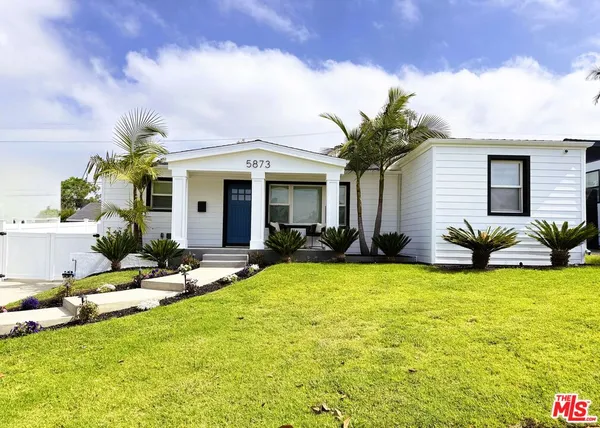 a view of a house with swimming pool and porch