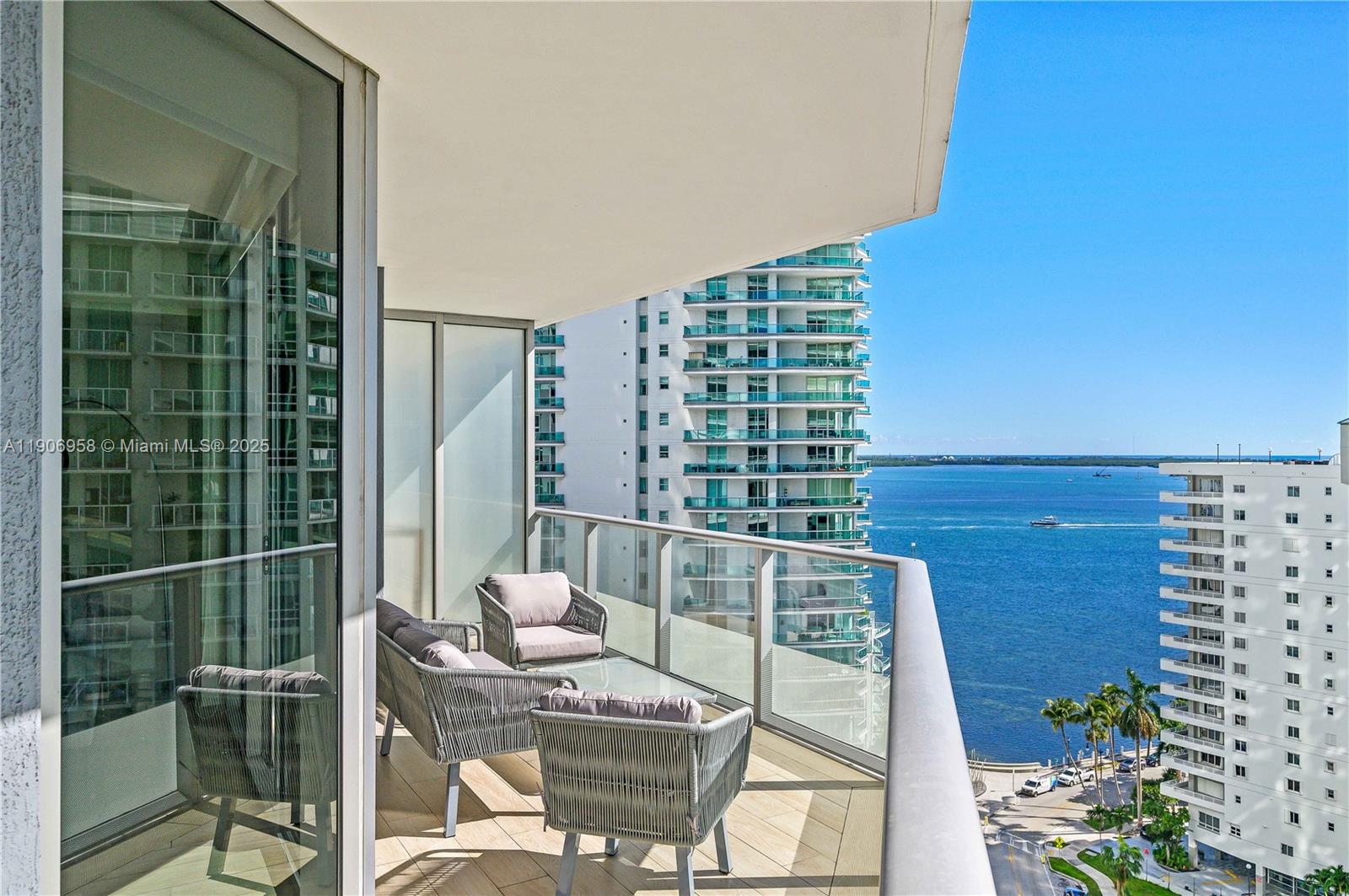 1300 Brickell Bay Drive, Unit 1603 Miami, FL 33131 - Photo 1 of 17 a view of balcony with couch