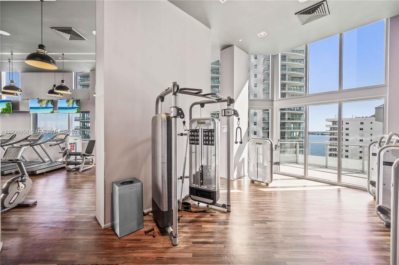 1300 Brickell Bay Drive, Unit 1603 Miami, FL 33131 - Photo 13 of 17 a view of a room with gym equipment