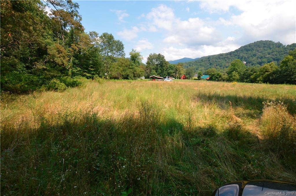 85 Setzercove Road Maggie Valley, NC 28751 - Photo 6 of 11 a view of an outdoor space and a yard