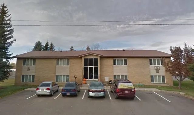 a car parked in front of a house