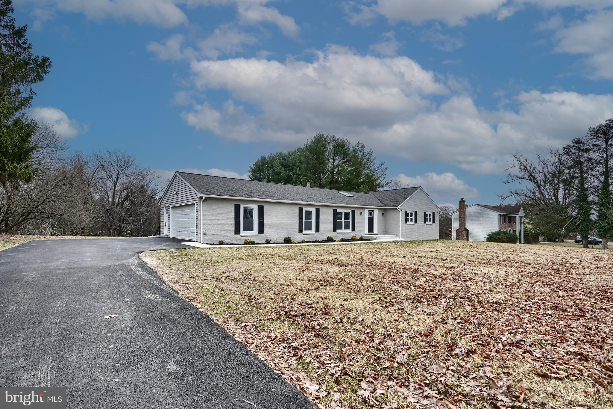 Exterior front, driveway and garage