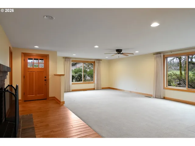 a bathroom with a sink a mirror and a shower