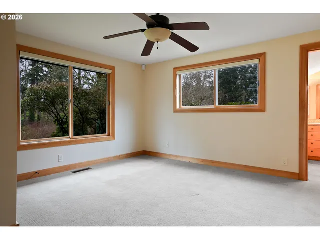a picture of an empty room with a window
