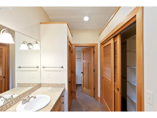 a bathroom with a shower and a shower