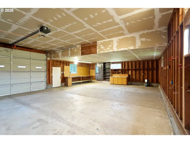 a view of a park with large trees