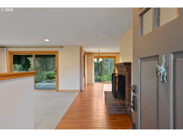 a view of a hallway view with living room and with furniture