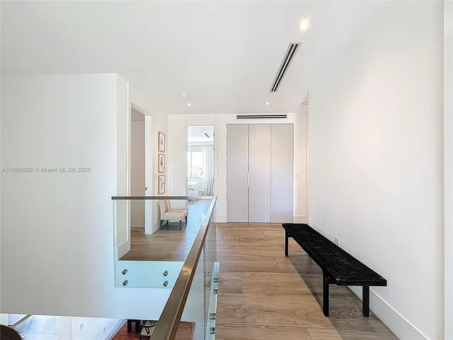 a view of a hallway with entryway