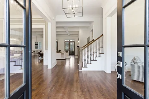 a view of a dining room with furniture and window