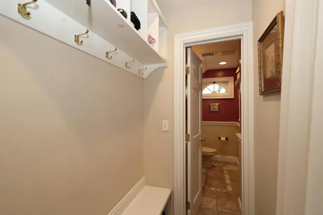 a view of a bathroom from a hallway