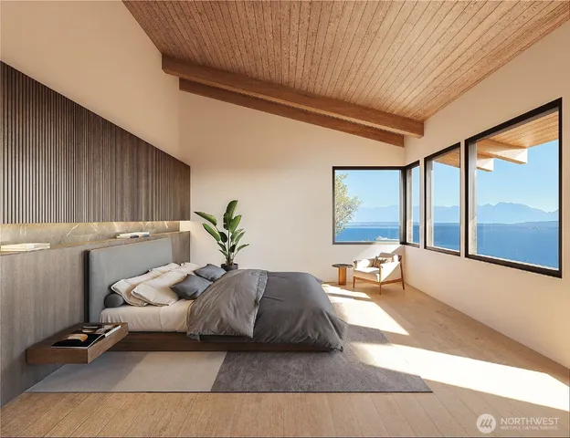 a living room with furniture large windows and wooden floor