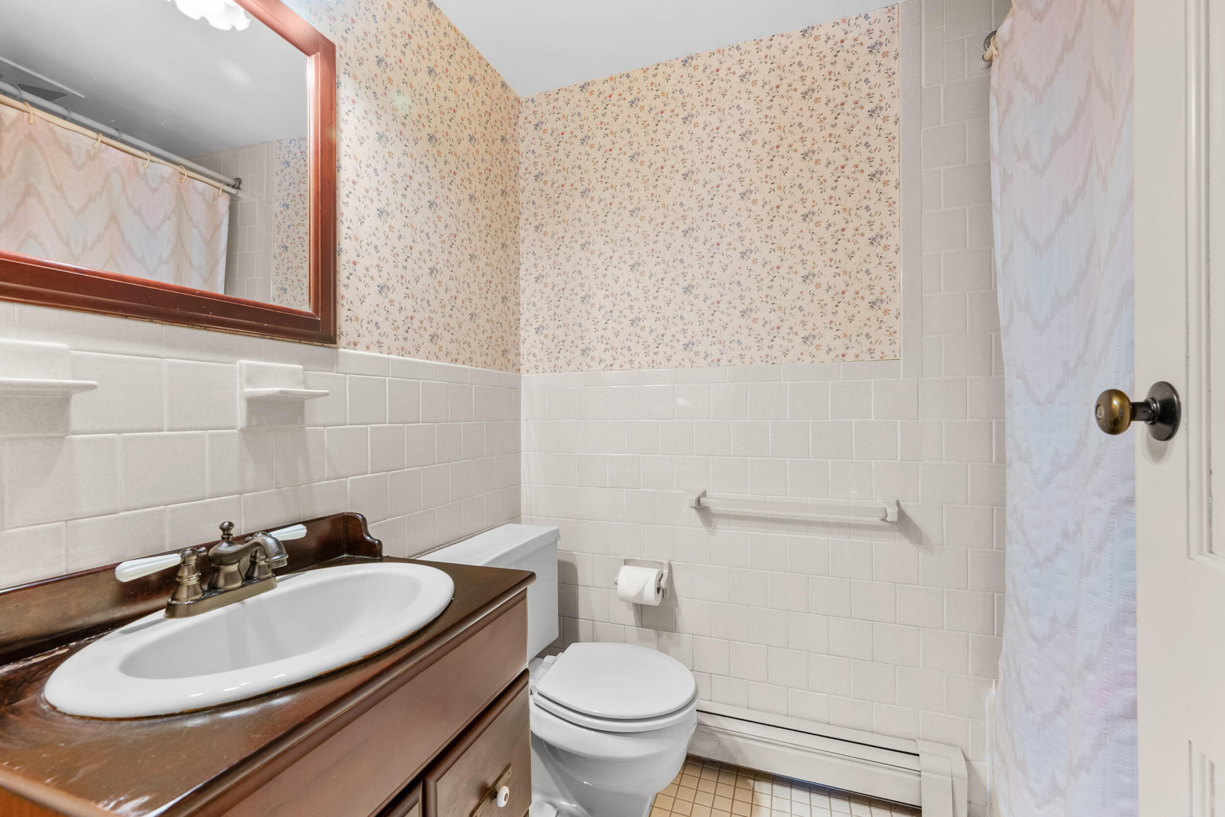 114 Bucks Creek Road Chatham, MA 02633 - Photo 15 of 43 a bathroom with a sink toilet and a mirror
