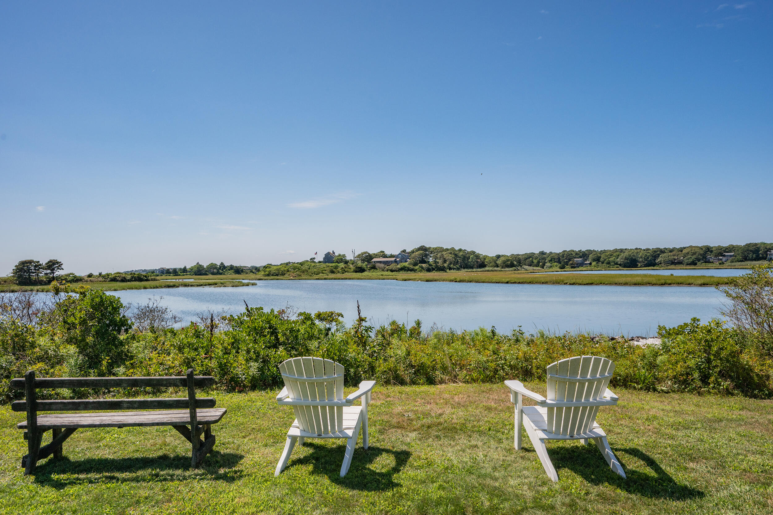 114 Bucks Creek Road Chatham, MA 02633 - Photo 2 of 43 a garden view with a lake view