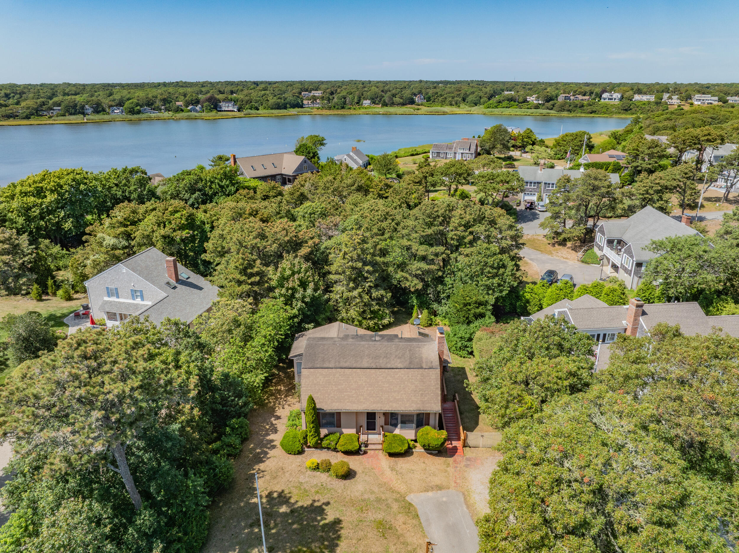 114 Bucks Creek Road Chatham, MA 02633 - Photo 24 of 43 an aerial view of a house with a garden and lake view