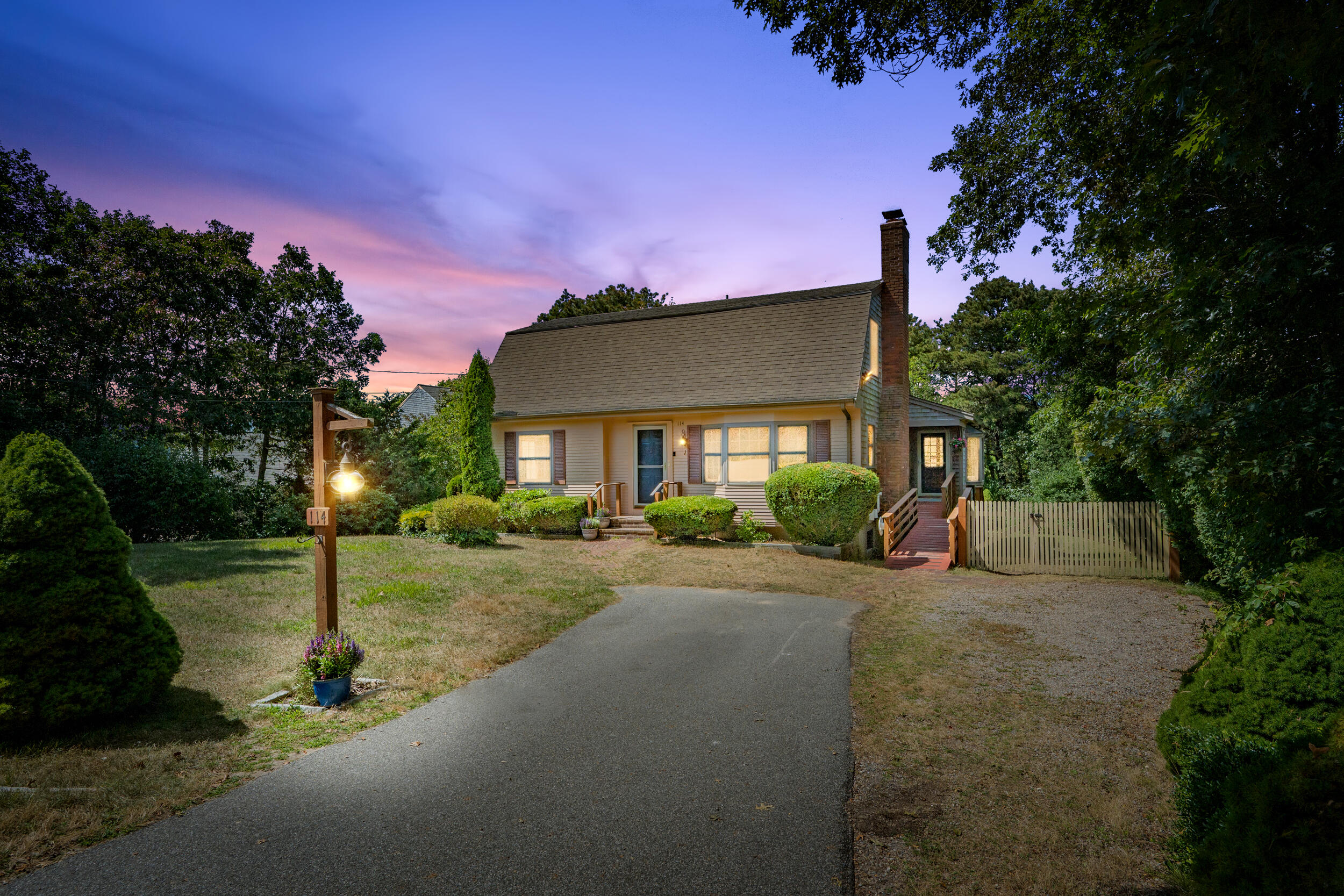 114 Bucks Creek Road Chatham, MA 02633 - Photo 42 of 43 a front view of a house with a yard