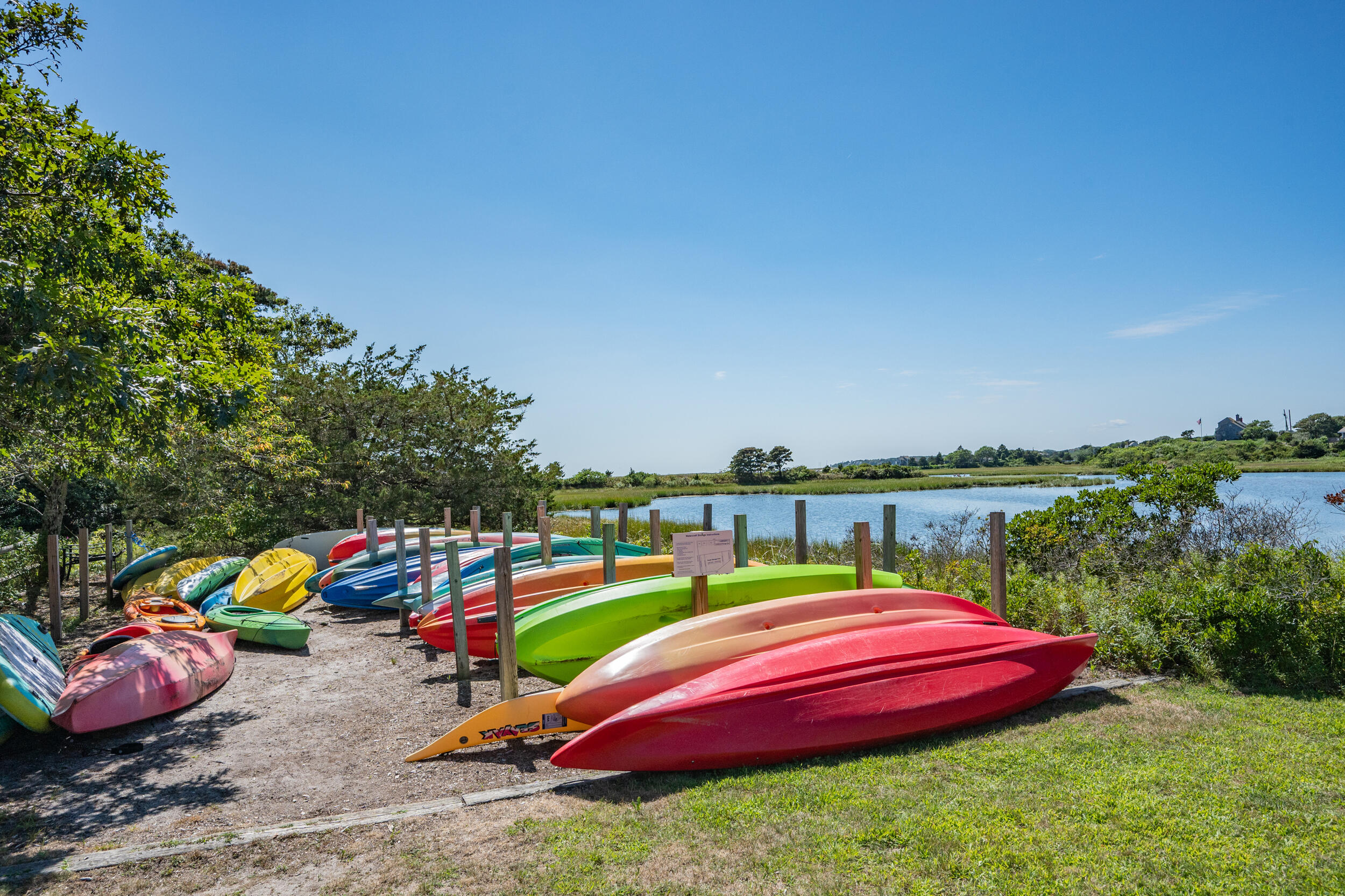 114 Bucks Creek Road Chatham, MA 02633 - Photo 5 of 43 a swimming pool with outdoor seating and yard