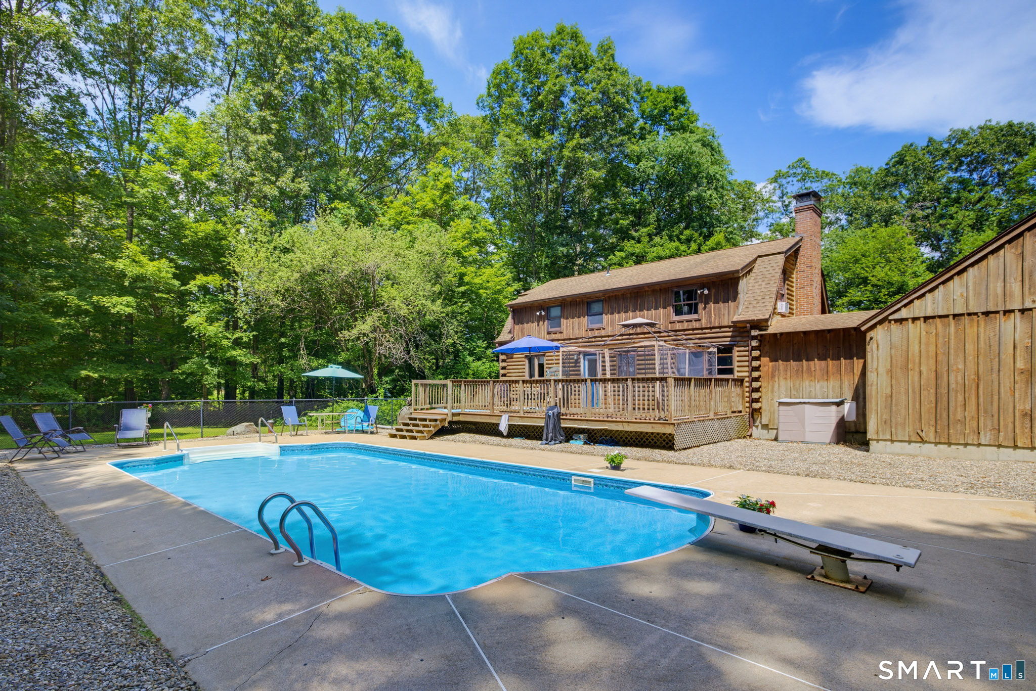 151 Fire Tower Road Eastford, CT 06242 - Photo 3 of 39 Inground pool with expansive patio create an outdoor entertainment space for family and friends!