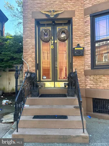 a front view of a house having yard