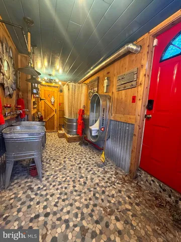 a room with lots of furniture and fish tank