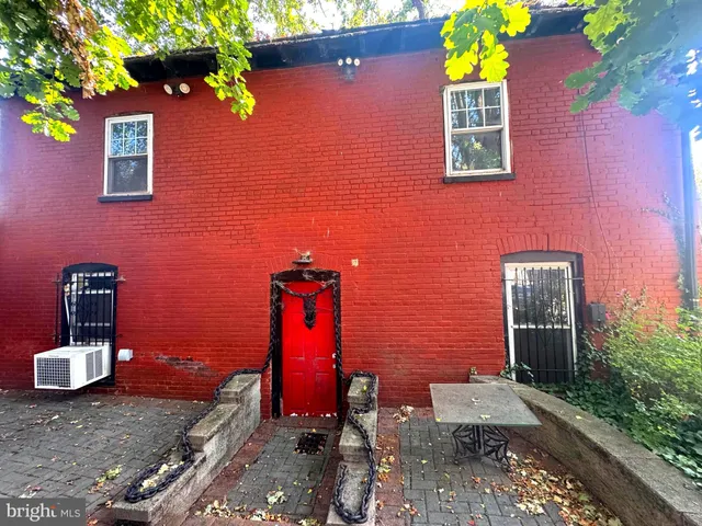 a car parked in front of a house