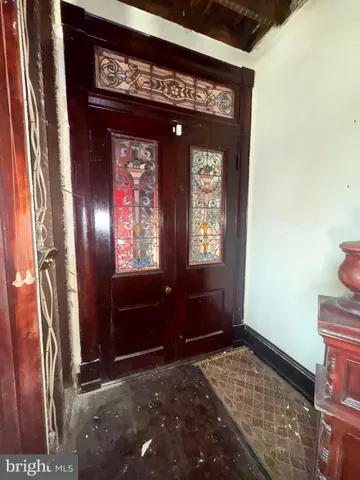 a view of entryway with a hallway