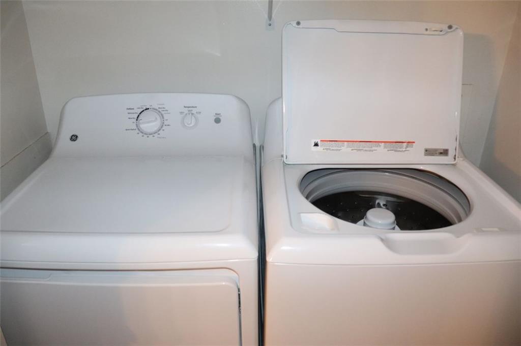 2572 Stratford Lane Morrow, GA 30260 - Photo 14 of 17 a utility room with dryer and washer