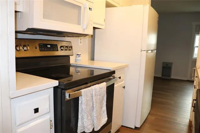 a view of a kitchen with utility room