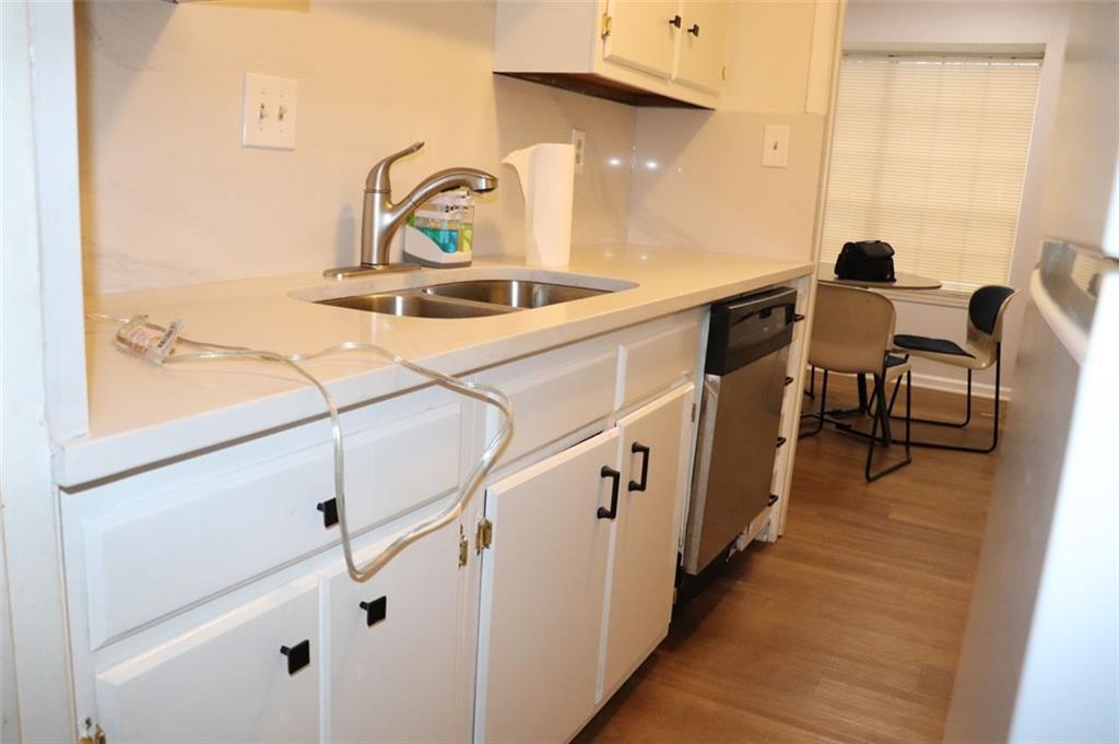 2572 Stratford Lane Morrow, GA 30260 - Photo 10 of 17 a view of a kitchen with utility room