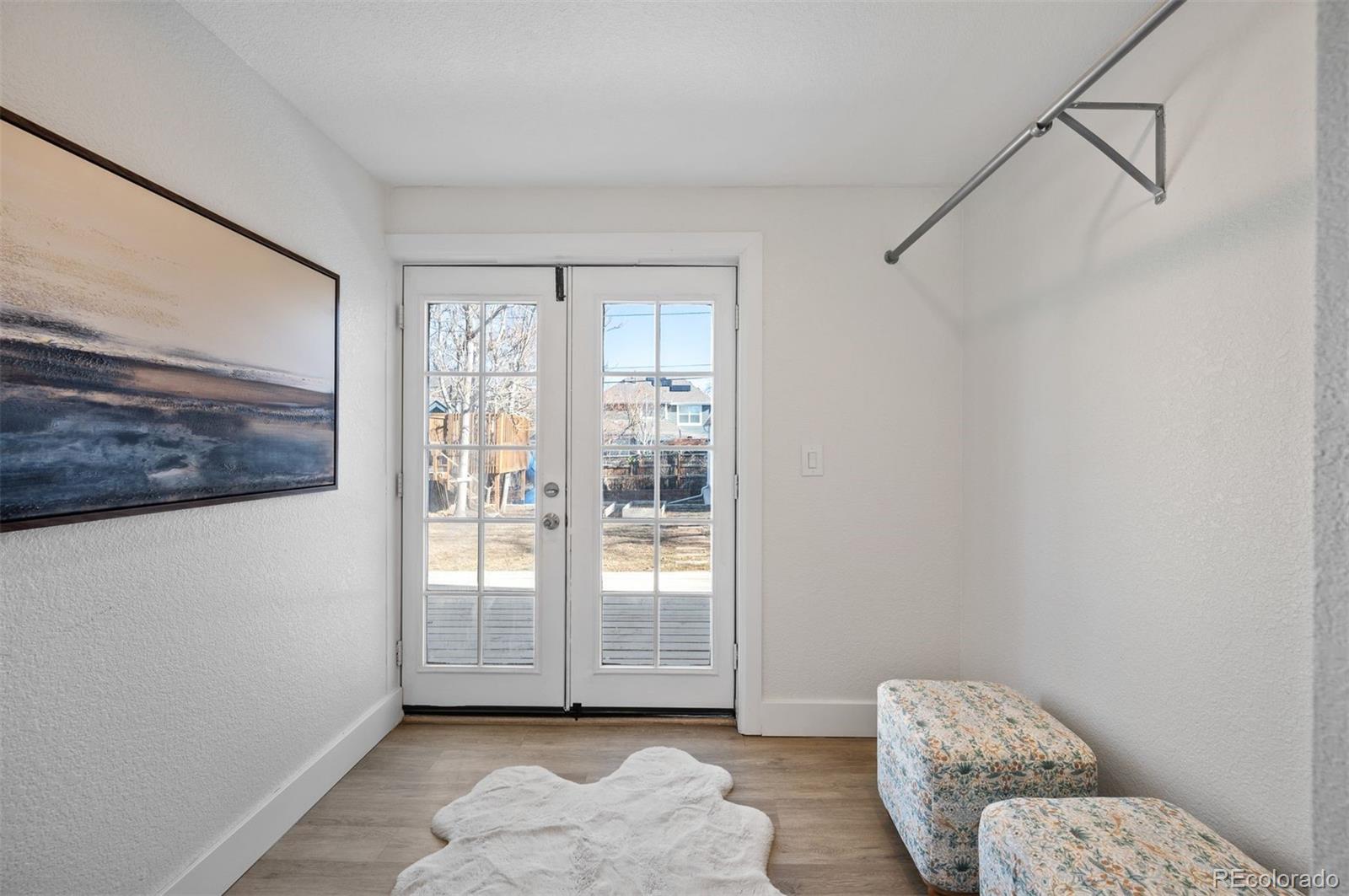 1422 Quebec Street Denver, CO 80220 - Photo 7 of 19 a view of livingroom with furniture and windows