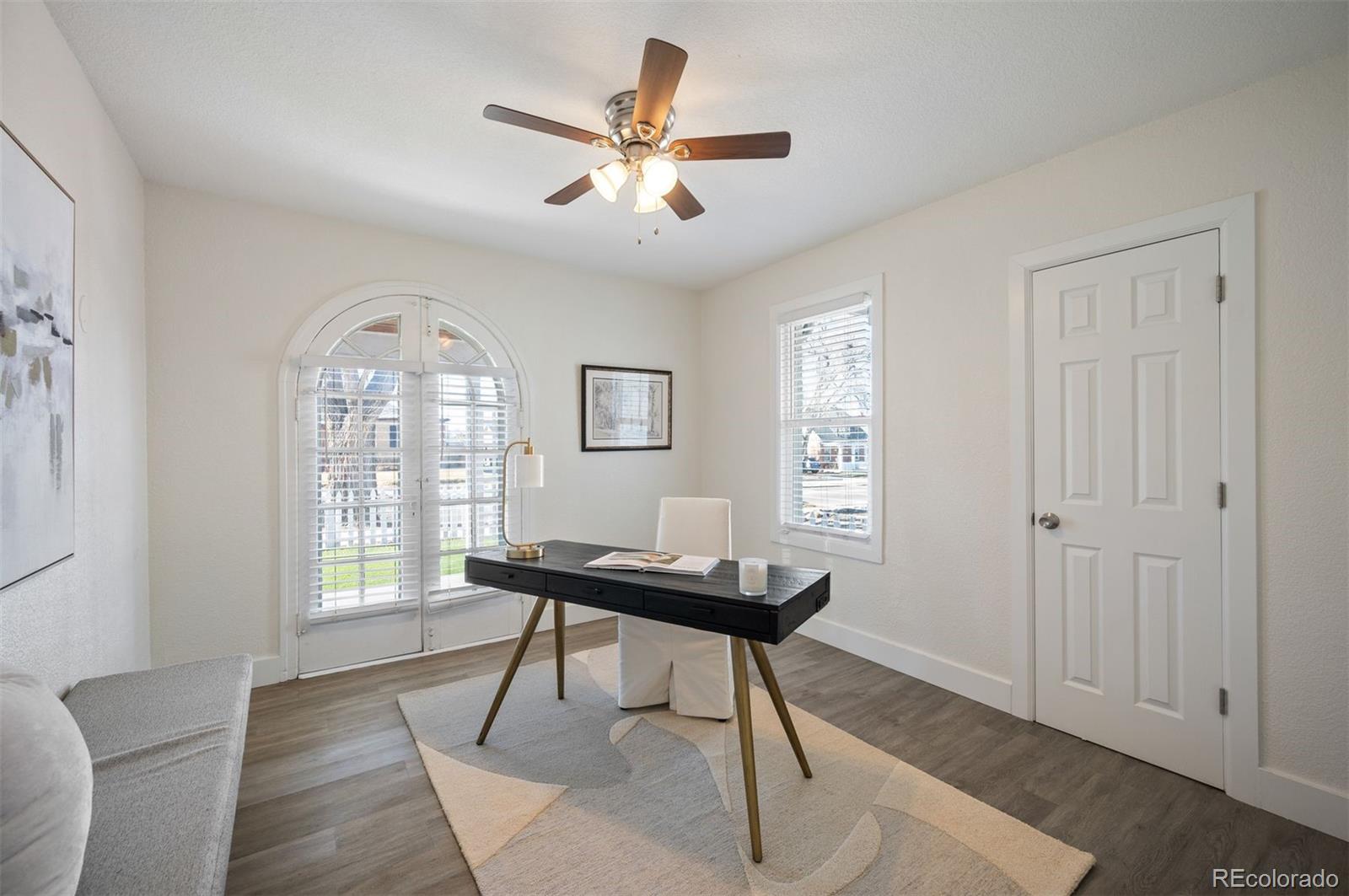 1422 Quebec Street Denver, CO 80220 - Photo 8 of 19 a workspace with furniture and window