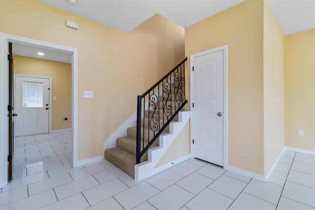 a view of entryway with a front door