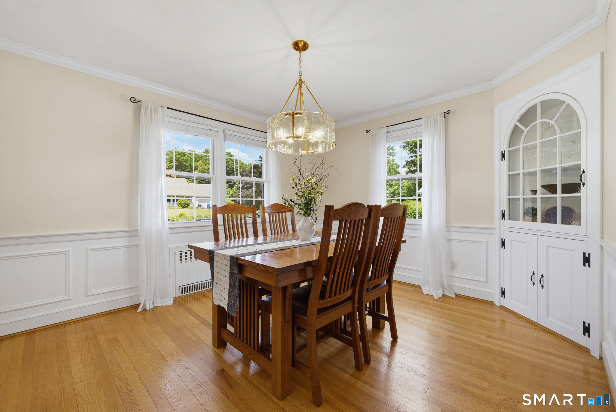 224 Spring Street Manchester, CT 06040 - Photo 5 of 39 a view of a dining room with furniture window and wooden floor
