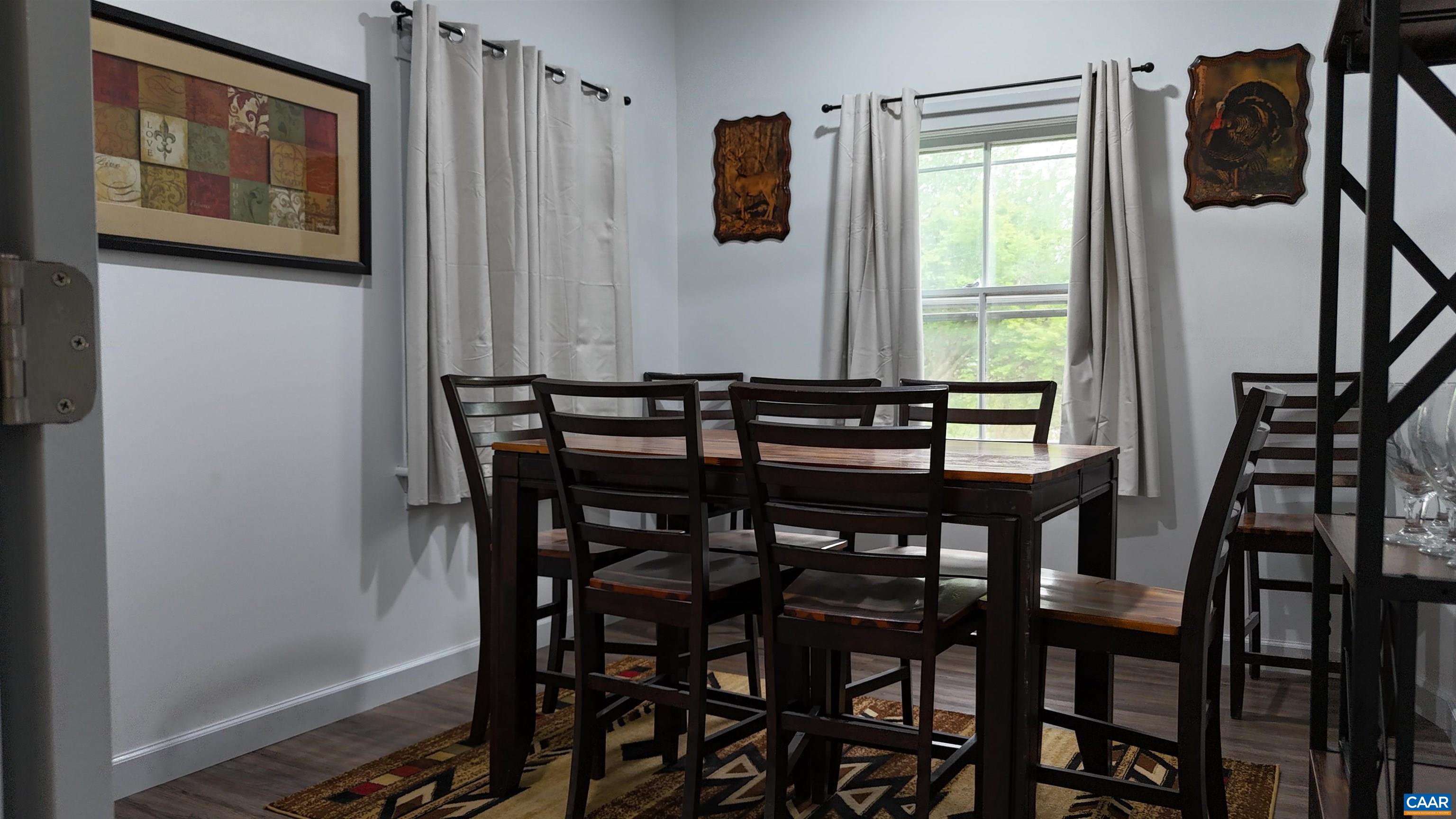 7559 Esmont Road Esmont, VA 22937 - Photo 14 of 22 a view of a dining room with furniture and window