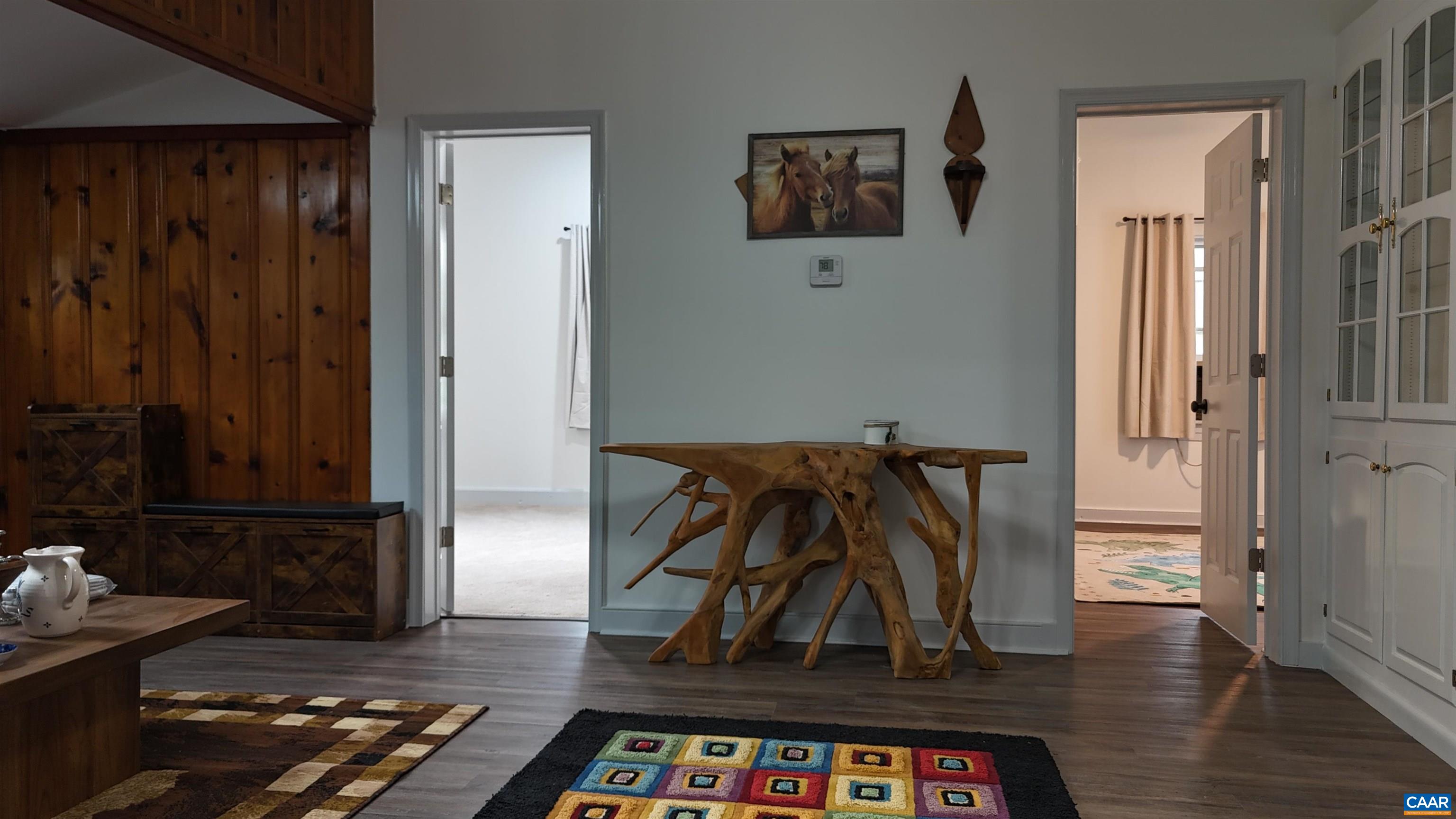 7559 Esmont Road Esmont, VA 22937 - Photo 16 of 22 a room with furniture and wooden floor