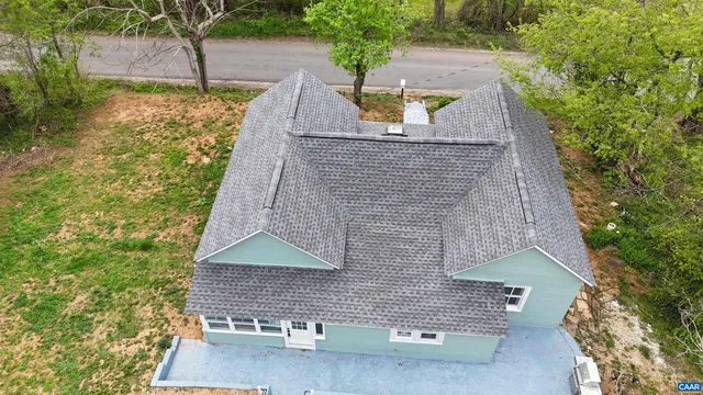 a kitchen with granite countertop a stove and a sink