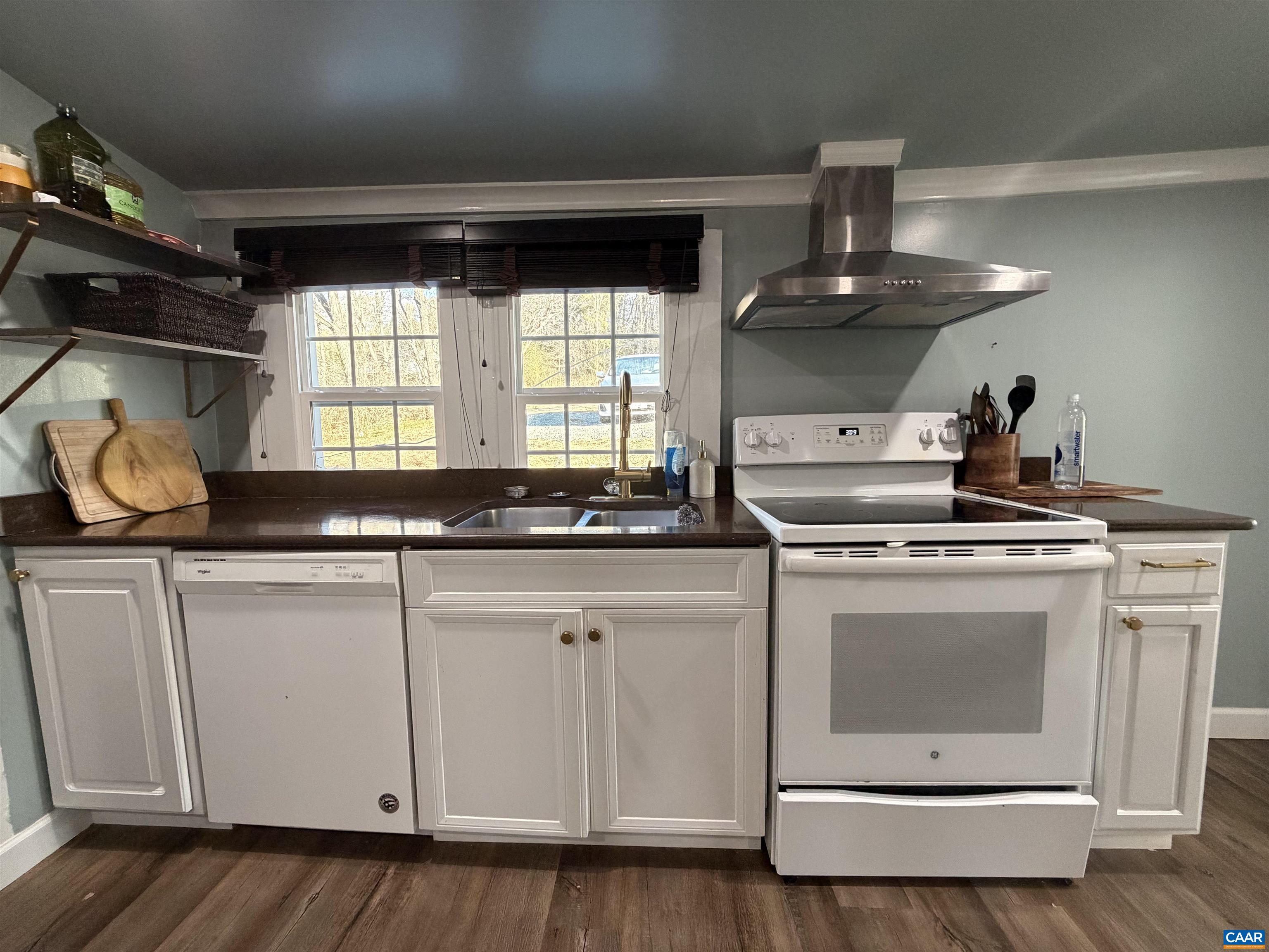 7559 Esmont Road Esmont, VA 22937 - Photo 10 of 22 a kitchen with granite countertop a stove and a sink