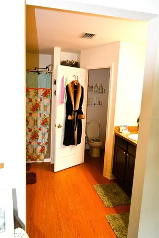 a bathroom with a sink and mirror