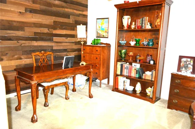a view of a chairs and table in a room