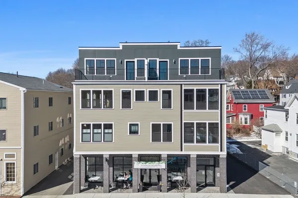a front view of a multi story building