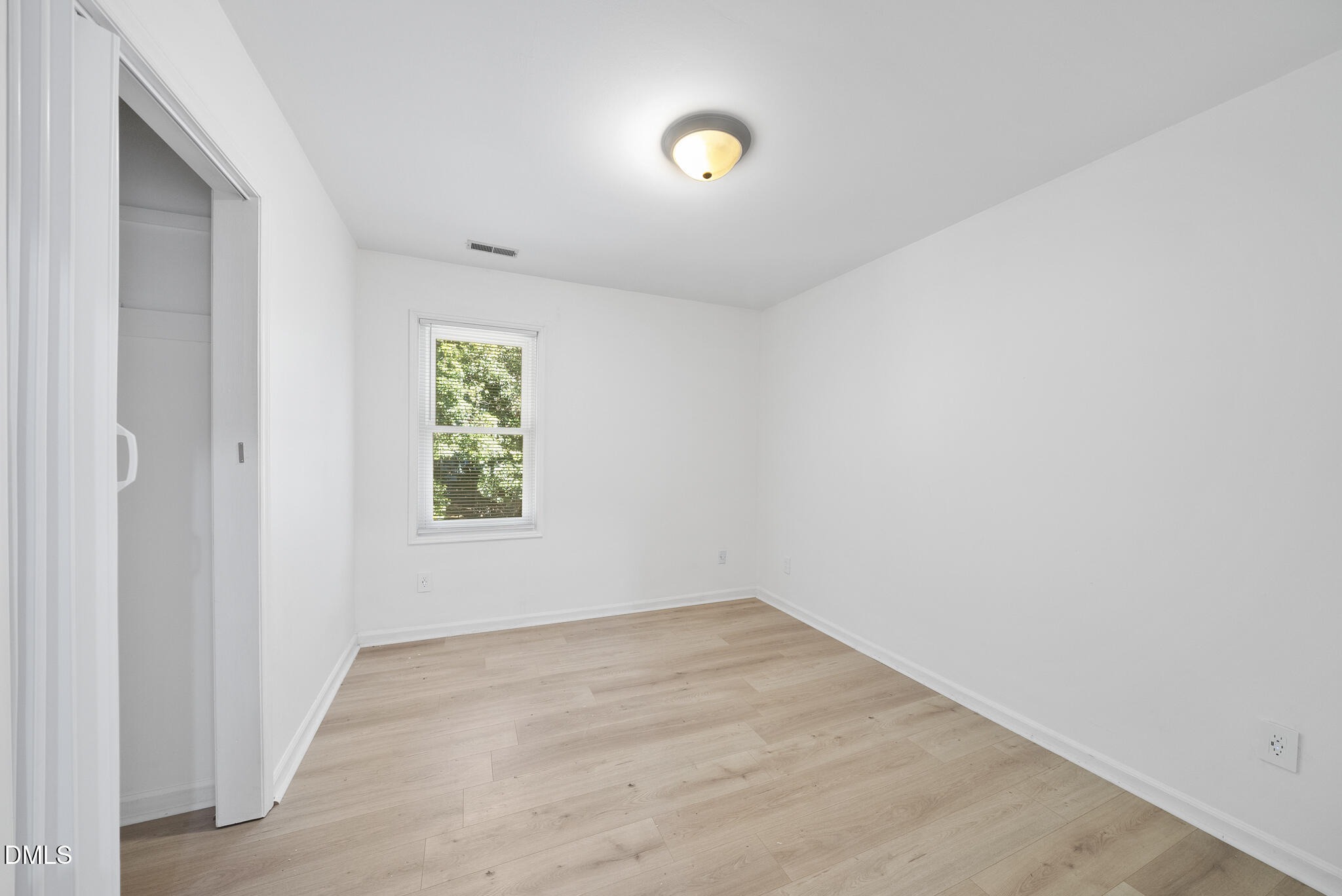 6108 New Market Way Raleigh, NC 27609 - Photo 27 of 31 an empty room with a window