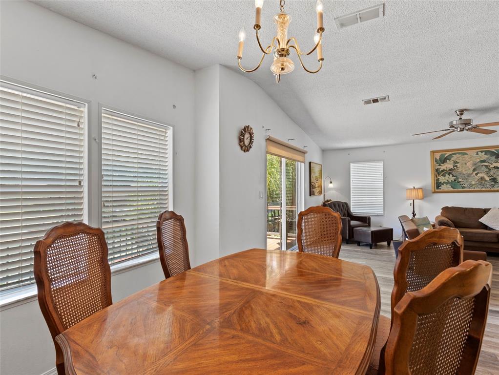 6297 Fine Street Weeki Wachee, FL 34607 - Photo 11 of 52 a bedroom with furniture and a window