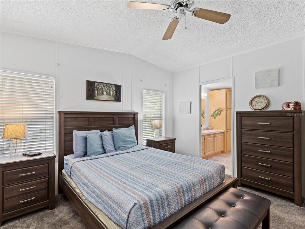 6297 Fine Street Weeki Wachee, FL 34607 - Photo 19 of 52 a bedroom with a bed and a dresser