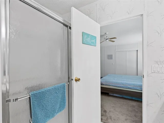 a bathroom with a sink and mirror