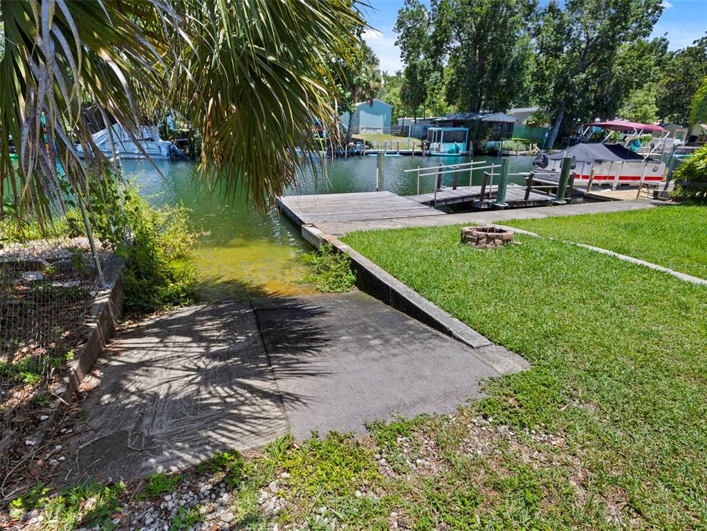 6297 Fine Street Weeki Wachee, FL 34607 - Photo 35 of 52 a view of a house with a yard