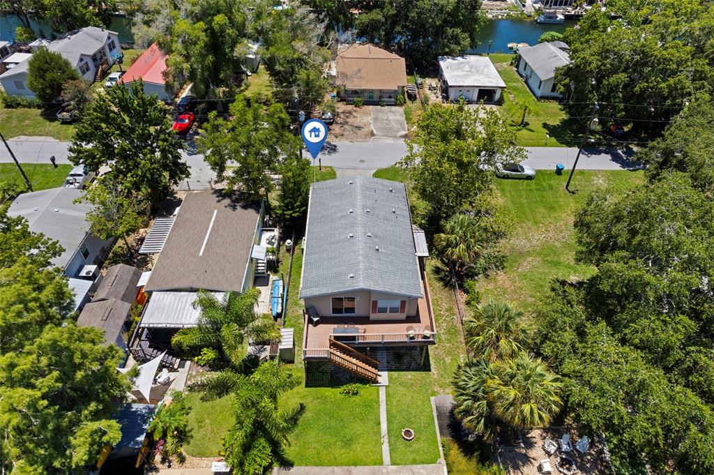 6297 Fine Street Weeki Wachee, FL 34607 - Photo 47 of 52 an aerial view of a house with a garden