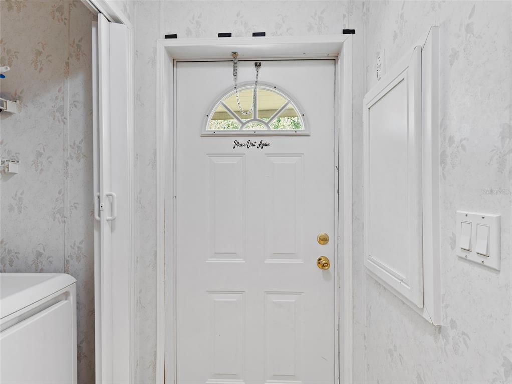 6297 Fine Street Weeki Wachee, FL 34607 - Photo 5 of 52 a bathroom with a granite countertop shower and a sink