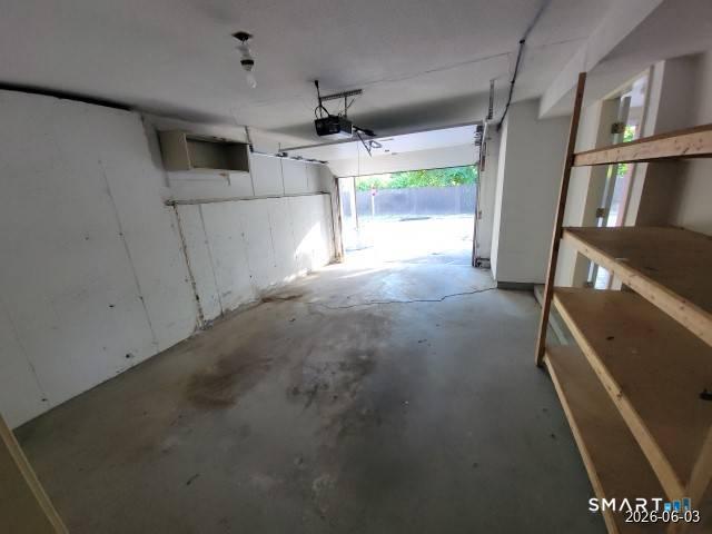 28 Commodore Cmns, Unit 28 Derby, CT 06418 - Photo 16 of 17 a view of a garage