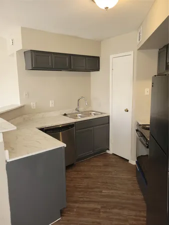 a utility room with washer and dryer